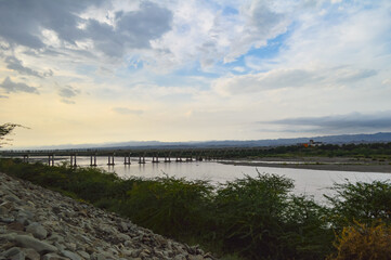 Obraz premium river and sky bridge landscape clouds