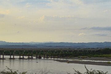 landscape with river and clouds Baluchistan city Turbat bridge wonderful mountain