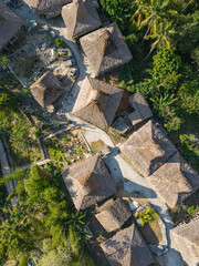 West Sumba, East Nusa Tenggara, Indonesia –  07. 15. 2024 – Sumba’s traditional stilt houses have three levels: the bottom for livestock, the middle for human habitation, and the top for food storage