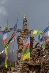 Stone stupa covered with praying flags in the himalayas.
