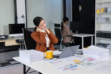 Businesswoman overworked with fatigue.