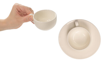 Empty coffee cup in woman hand isolated on white.