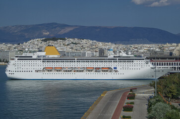 Classic cruiseship or cruise ship liner Neo Riviera in Piraeus Athens, Greece port on sunny day...