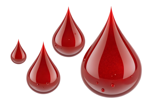 Close up of multiple red liquid droplets on a light surface.