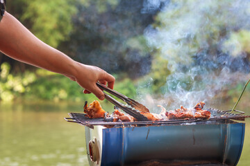 hand Grill the meat on the grill on holiday