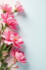 Fototapeta premium Delicate Pink Blossoms Arranged on a Pastel Background, Creating a Serene and Elegant Floral Composition Perfect for Invitations, Greeting Cards, or Decorative Purposes