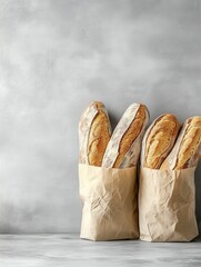 Freshly Baked Baguettes in Paper Bags on a Rustic Gray Background Capturing Culinary Simplicity and Warmth with a High Angle