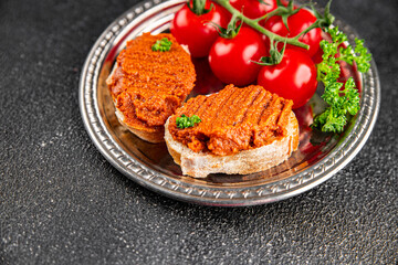 Pepper pate red pepper dip roasted vegetable hummus appetizer vegetables dish fresh gourmet food background on table rustic food top view copy space keto and paleo diet vegetarian and vegan food