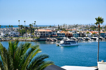 Luxury waterfront homes in Newport Beach Harbor in Orange County, Southern California. 