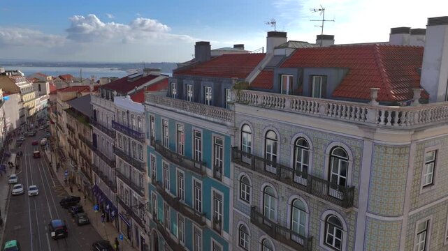 Azulejo Fascades in Lisbon. Aerial view of an Old Portuguese House decorated with Ceramic Tiles - Traditional Azulejo