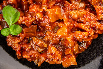 Eggplant stew dish vegetables salad tasty fresh delicious gourmet food background on table rustic food top view copy space keto and paleo diet vegetarian and vegan food