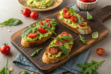 Flat lay of delicious bruschettas with toast, guacamole, basil and cherry tomatoes on wooden board served with arugula - generated by ai