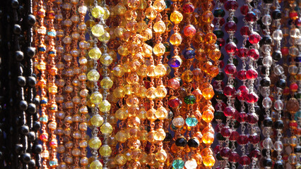 Decorative pearl chains on display in a fashion shop