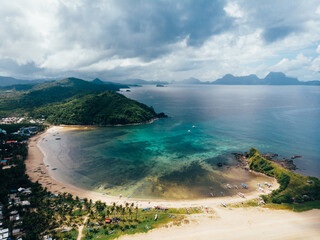 A Beautiful lagoon on the tropical island paradise of Palawan, Philippines, in Nacpan Beach near El Nido. Stunning Beach Destination