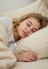 Obraz premium Woman sleeping in luxurious bed linens with an airy atmosphere