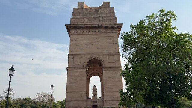 Side view of the historic India Gate war memorial at sunset, in the city of New Delhi, Delhi, India