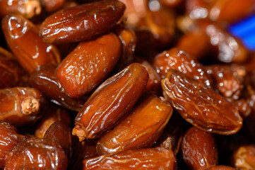 Deliciously sweet dried dates ready for tasting at a local market during the vibrant afternoon sun