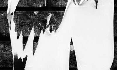 Old ripped torn blank black and white fly posters textures backgrounds grunge creased crumpled...