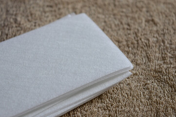 purple wax warmer containing melted yellow wax white waxing strips home professional waxing session hair removal treatments beauty skincare tutorial salon spa services removal kits waxing accessories