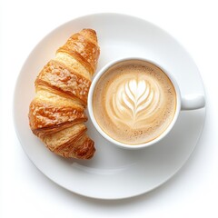 Delicious croissant and cappuccino with latte art on white plate for breakfast or brunch overhead shot