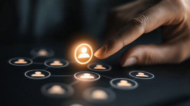 A business hand touches a glowing target icon, surrounded by people icons representing audience segmentation.