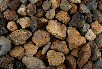 Close-up background texture of stones in different colors