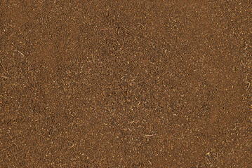 Close-up view of a land surface with detailed textures in brown tones