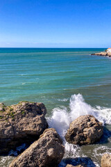 Wonderful landscapes of the shimmering sea and charming city unfold, offering breathtaking coastal views and a picturesque atmosphere in Nerja, Spain 