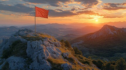 Red flag on mountain peak at sunset. Success and startup, leadership and victory concept