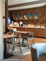 Cozy café interior with modern furniture and warm ambiance  