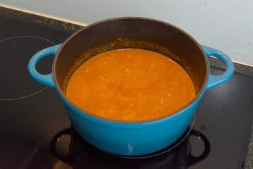 Warm and inviting, this rich goulash soup simmers to perfection in a charming light blue pot. A hearty blend of flavors and colors, ideal for cozy moments and culinary inspiration.