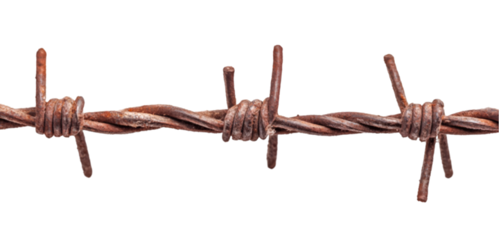 Rusty barbed wire close up detail sharp points danger hazard