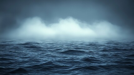 A dark blue ocean with a cloudy sky in the background