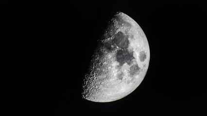Half moon in the black sky