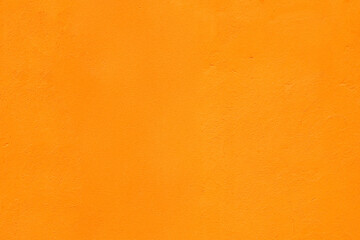 Vivid Textured Wall Painted in Intense Orange Color
