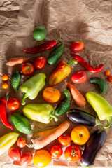 Organic vegetables on craft paper background.