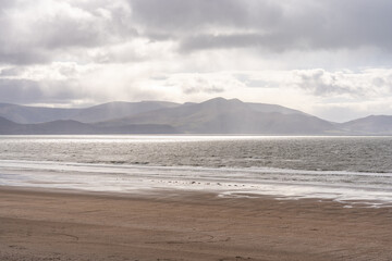 view of the coast of the sea meeting mountains 