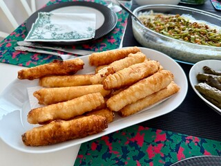 Cigarette pastry. Cheese pie on wood floor. Fried cheese rolls with phyllo. Local name sigara boregi.