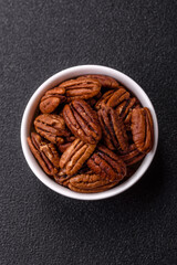 Nut, pecans in a ceramic bowl, an ingredient in vegan food