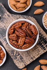Nut, pecans in a ceramic bowl, an ingredient in vegan food