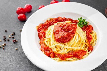 Spaghetti bolognese pasta tomato sauce tasty fresh delicious gourmet food background table rustic food top view copy space