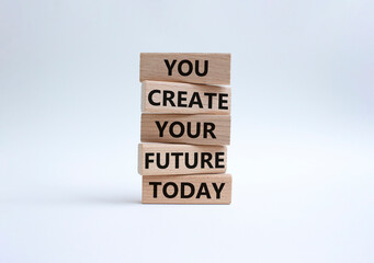 Naklejka premium Future and development symbol. Wooden blocks with words You Create your Future today. Beautiful white background. Business and Future and development concept. Copy space.