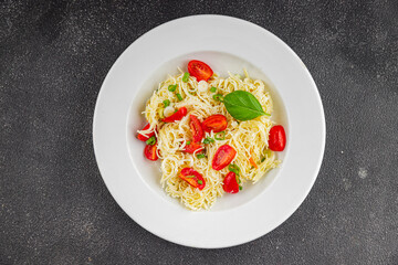 Pasta with tomatoes vermicelli vegetables dish fresh delicious gourmet food background on the table rustic food top view copy space