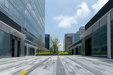 empty concrete ground in front of modern office buildings in downtown. floor for copy space