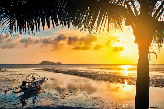 Fishing boat at sunset