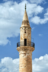 stone, historic minaret of Turkish mosque in Chania on the island of Crete