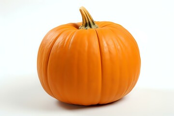 Obraz premium Fresh orange pumpkin isolated on white background, showing natural texture and stem detail. Suitable for seasonal marketing, food packaging, and harvest themes.