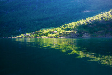 Mountain lake in Norway. Nature in fjords. High mountains and reflections on the surface of the...