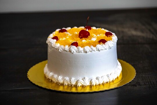 Classic Marta Rocha cake pie developed in honor of Miss Brazil made with egg thread, baba de mo&ccedil;a, walnuts, cherry and dried plum