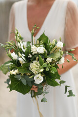 Bridal bouquet with the lisianthus and eucalyptus